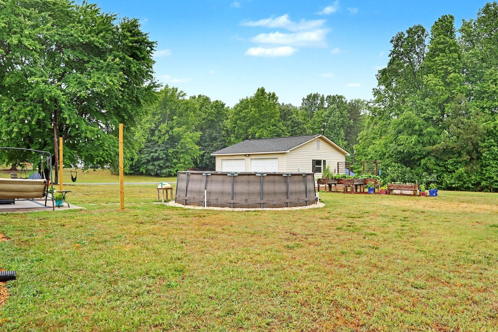 Backyard pool and swing at 1070 Legion Club Road Salisbury NC