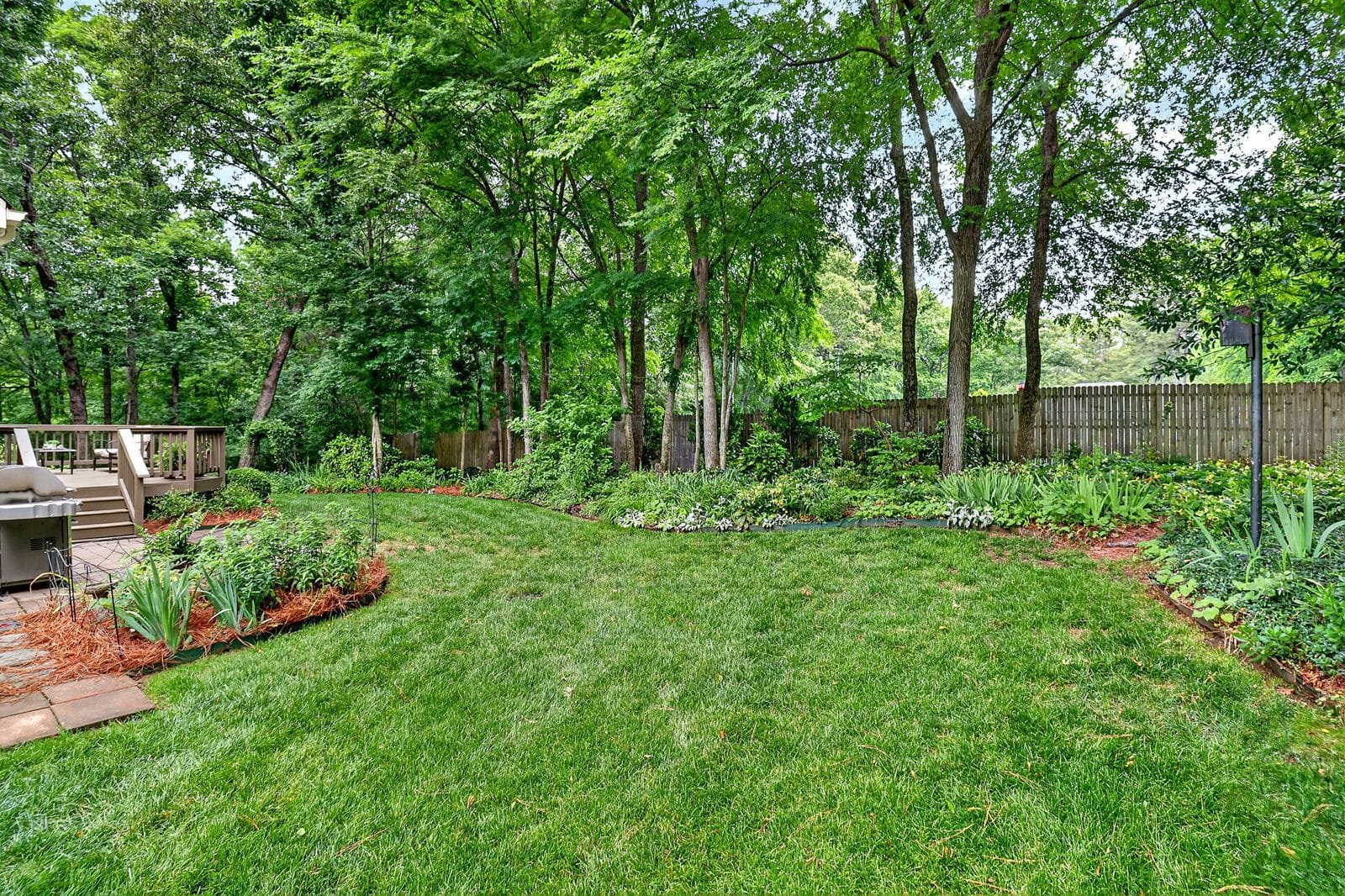 Private backyard with mature landscaping