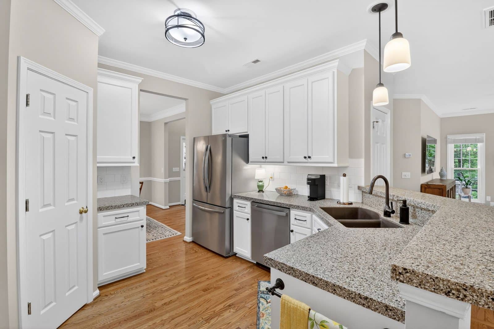 Updated kitchen with granite countertops and stainless appliances