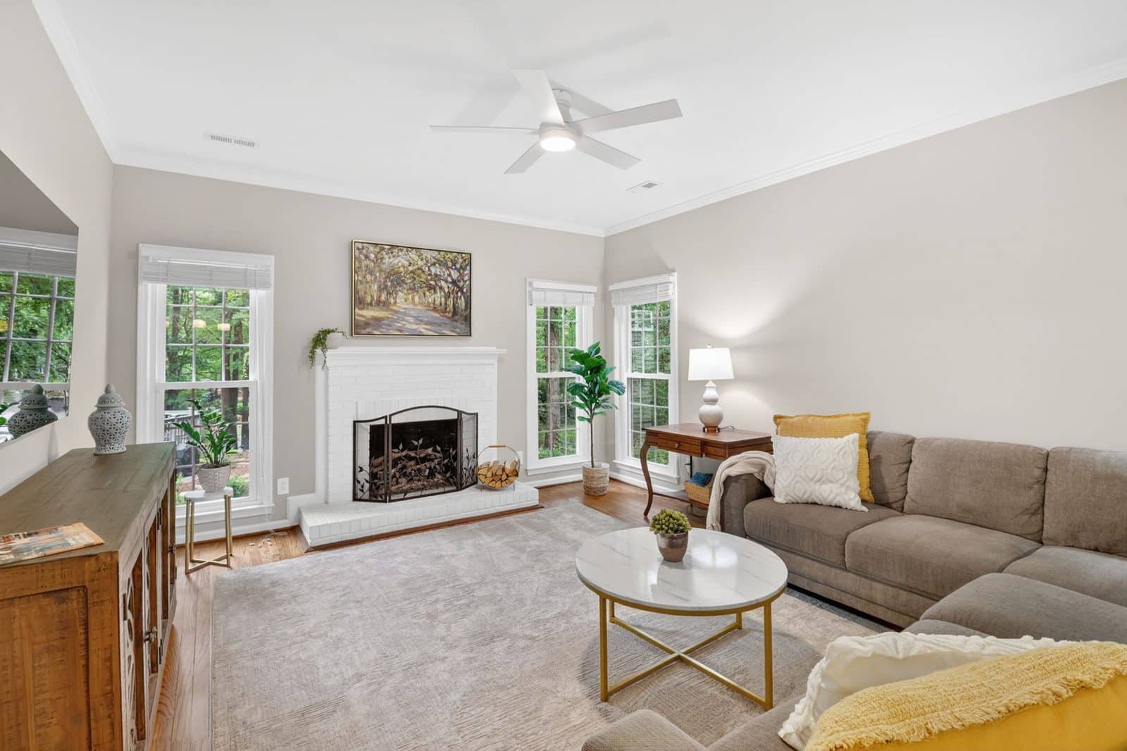 Living room with white brick fireplace